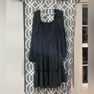 Plus size midi black long sleeve dress.